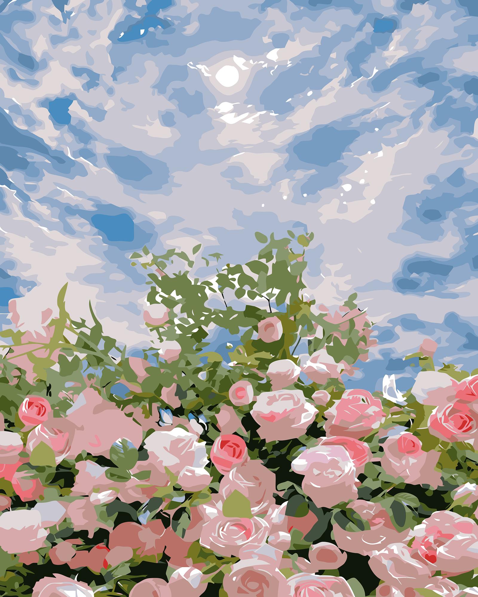 Pink roses with green leaves against a blue sky with clouds
