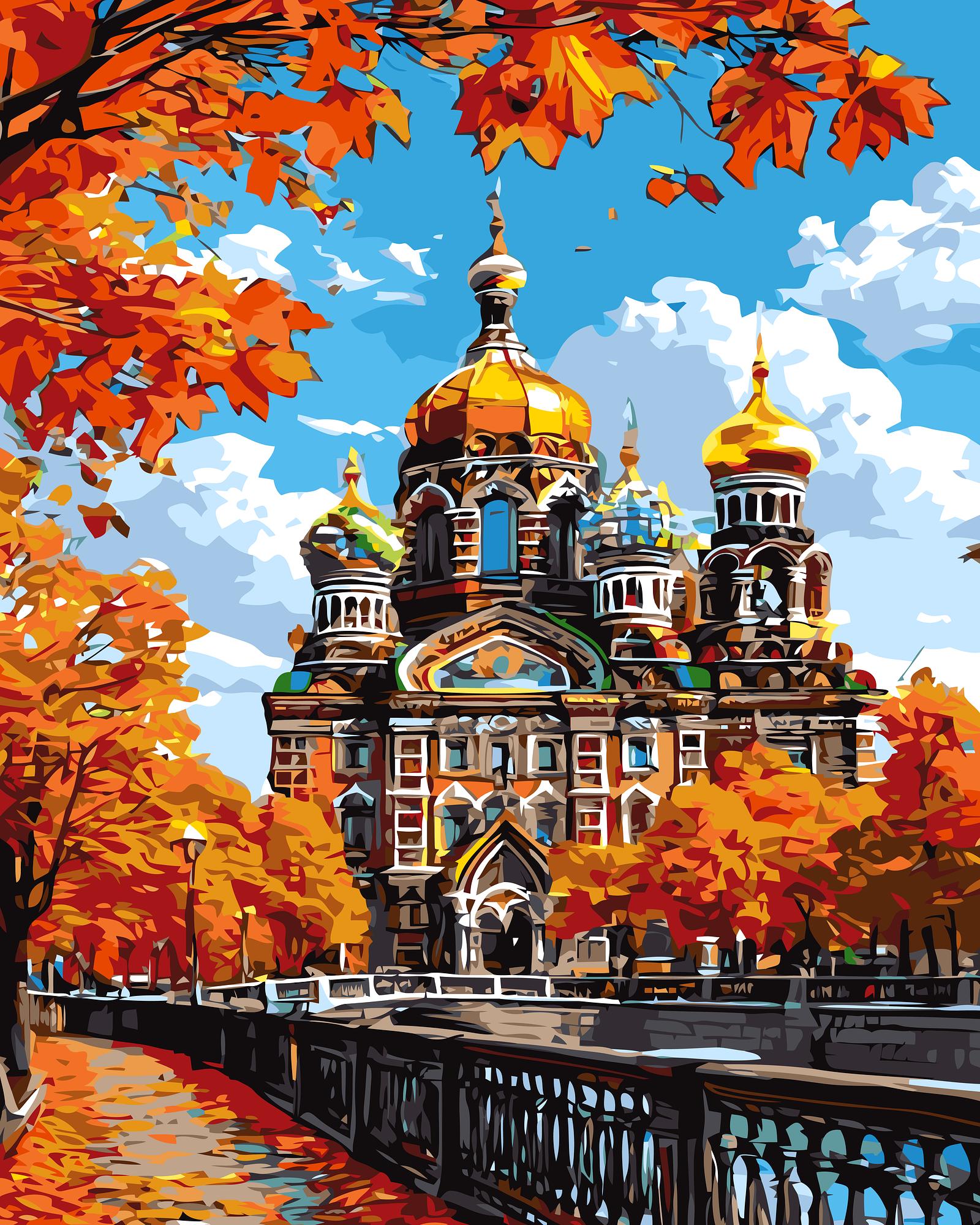Colorful autumn scene with a cathedral and trees in the foreground