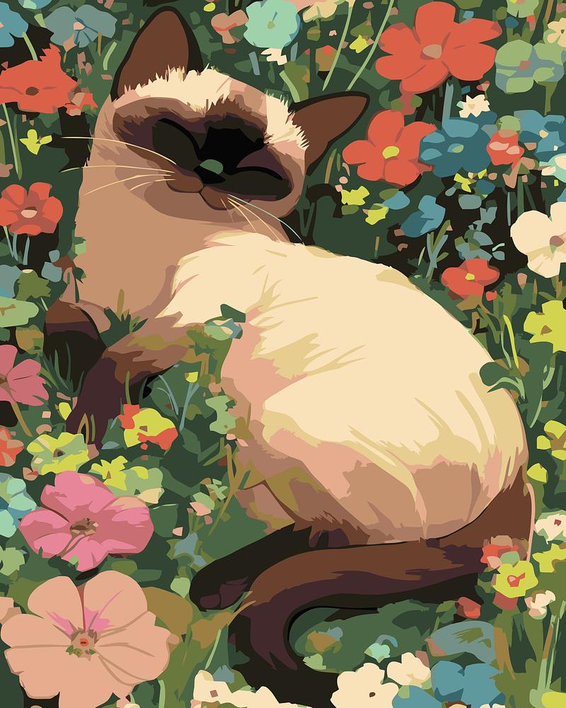 Siamese cat in a field of colorful flowers