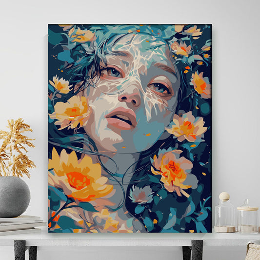 Artistic depiction of a woman's face with floral elements on a wall.