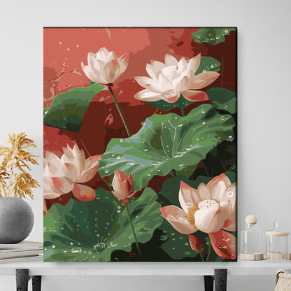 Framed artwork of pink lotus flowers on a red background