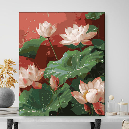 Framed artwork of pink lotus flowers on a red background