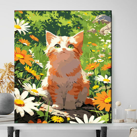 Canvas print of a cat in a garden with flowers on a wall.