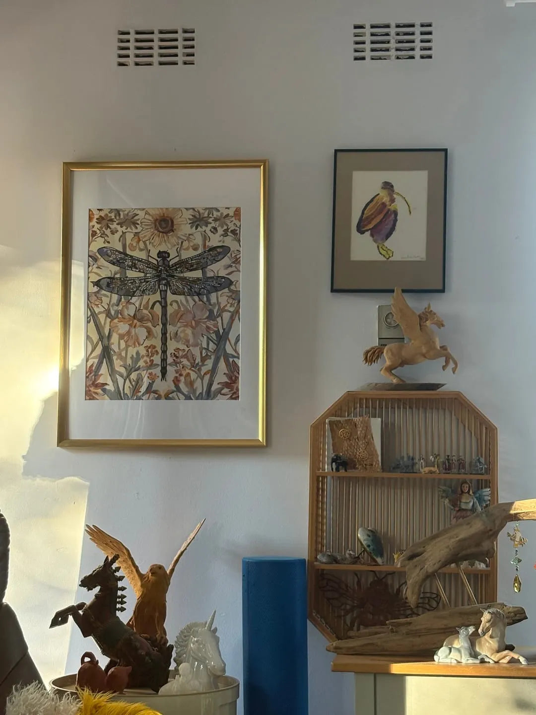 Customer's finished paint by numbers dragonfly artwork framed on a wall